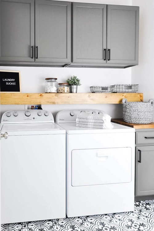 elegant monochromatic utility laundry room