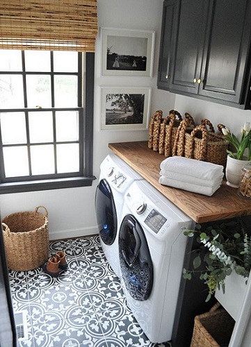 pretty laundry room in french provincial style feature
